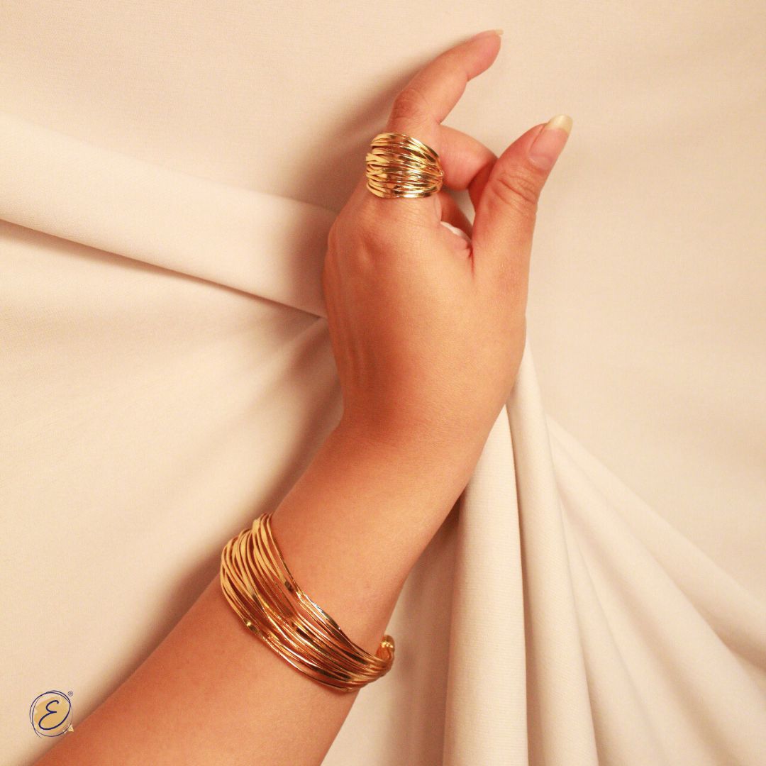 chunky gold ring , and chunky gold arm cuff