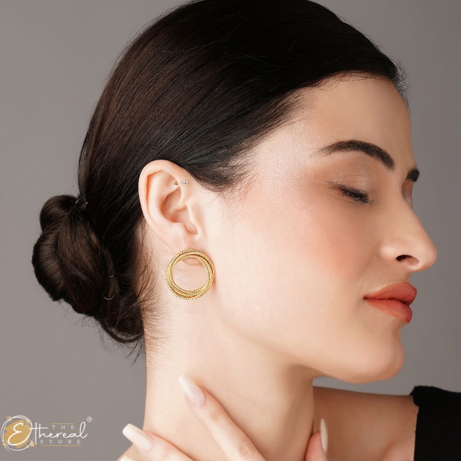 Loop design golden studs earrings