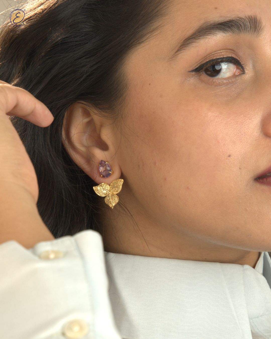Gold-plated amethyst stud earrings with detachable bougainvillea sidekick charm for festive and versatile wear.