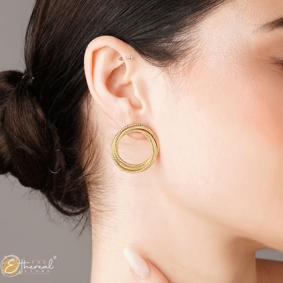 Loop design golden studs earrings