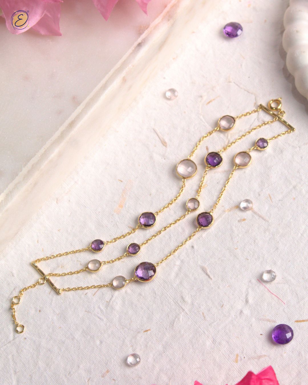 Gold Jiya Garden Glow Bracelet with rose quartz and amethyst stones from The Ethereal Store’s Baagh collection.