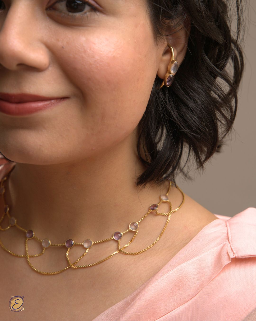 Gold-plated Jiya Cascade of Light Necklace with rose quartz and amethyst stones from The Ethereal Store’s Baagh collection.