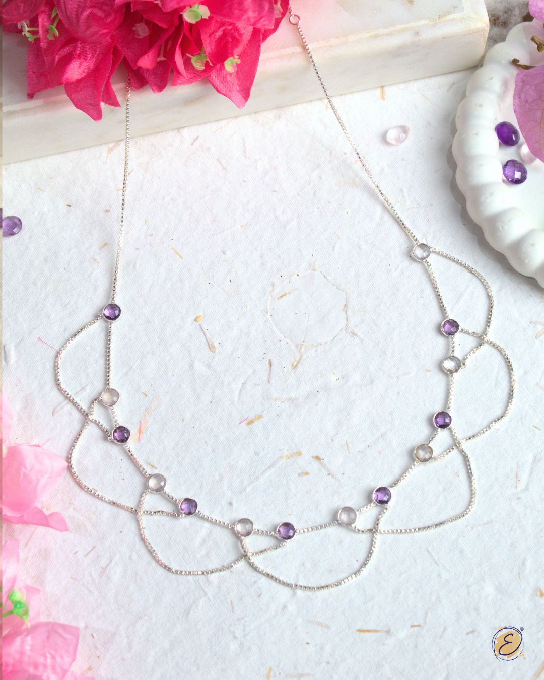 Silver-plated Jiya Cascade of Light Necklace with rose quartz and amethyst stones from The Ethereal Store’s Baagh collection.
