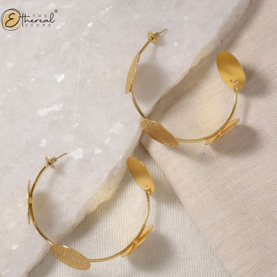 gold disc shaped hoops