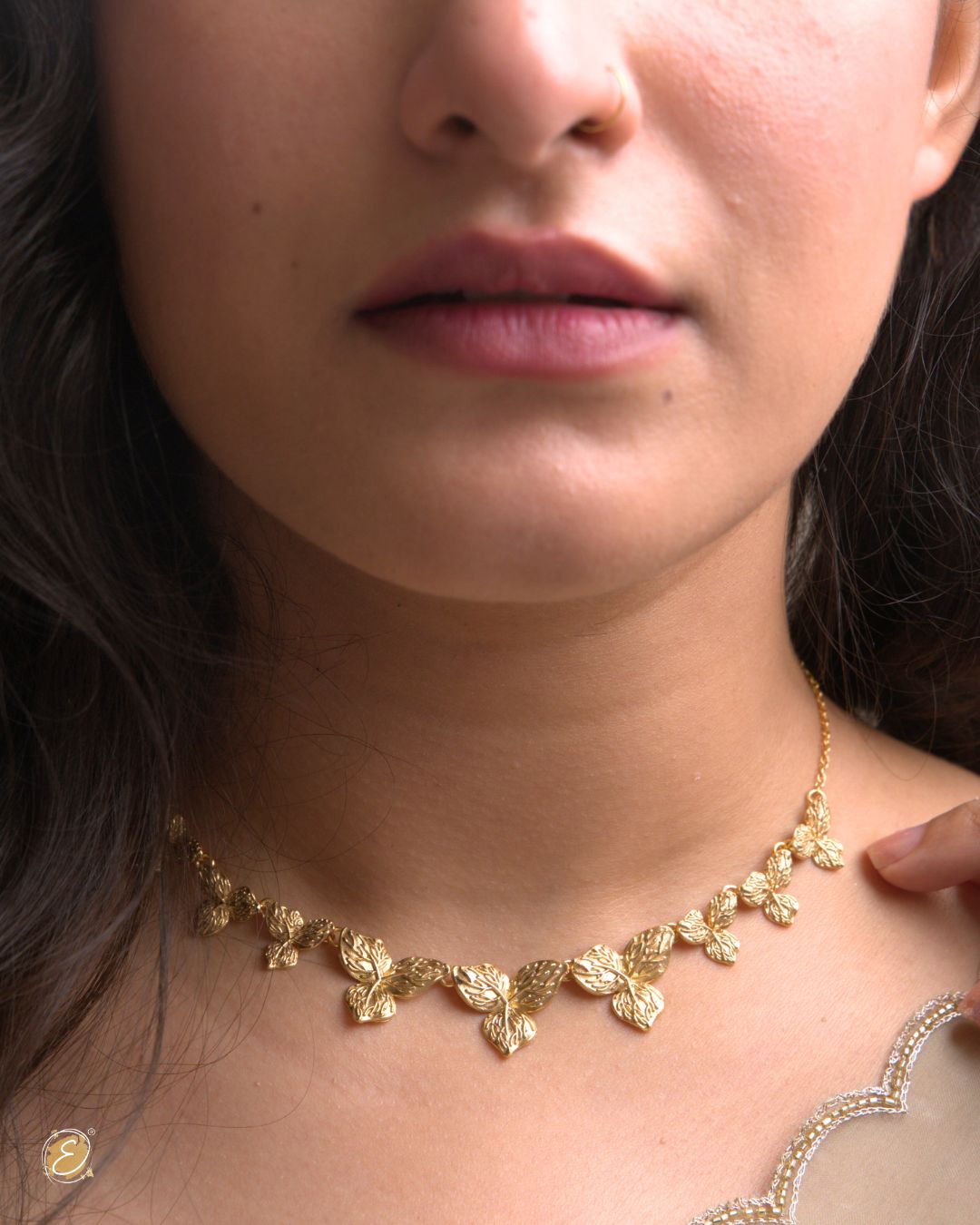 Zoya Flower Necklace with handcrafted bougainvillea blooms in 18k gold-plated brass, adjustable choker style.