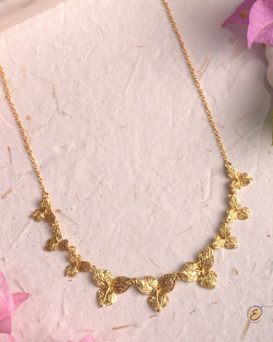 Zoya Flower Necklace with handcrafted bougainvillea blooms in 18k gold-plated brass, adjustable choker style.