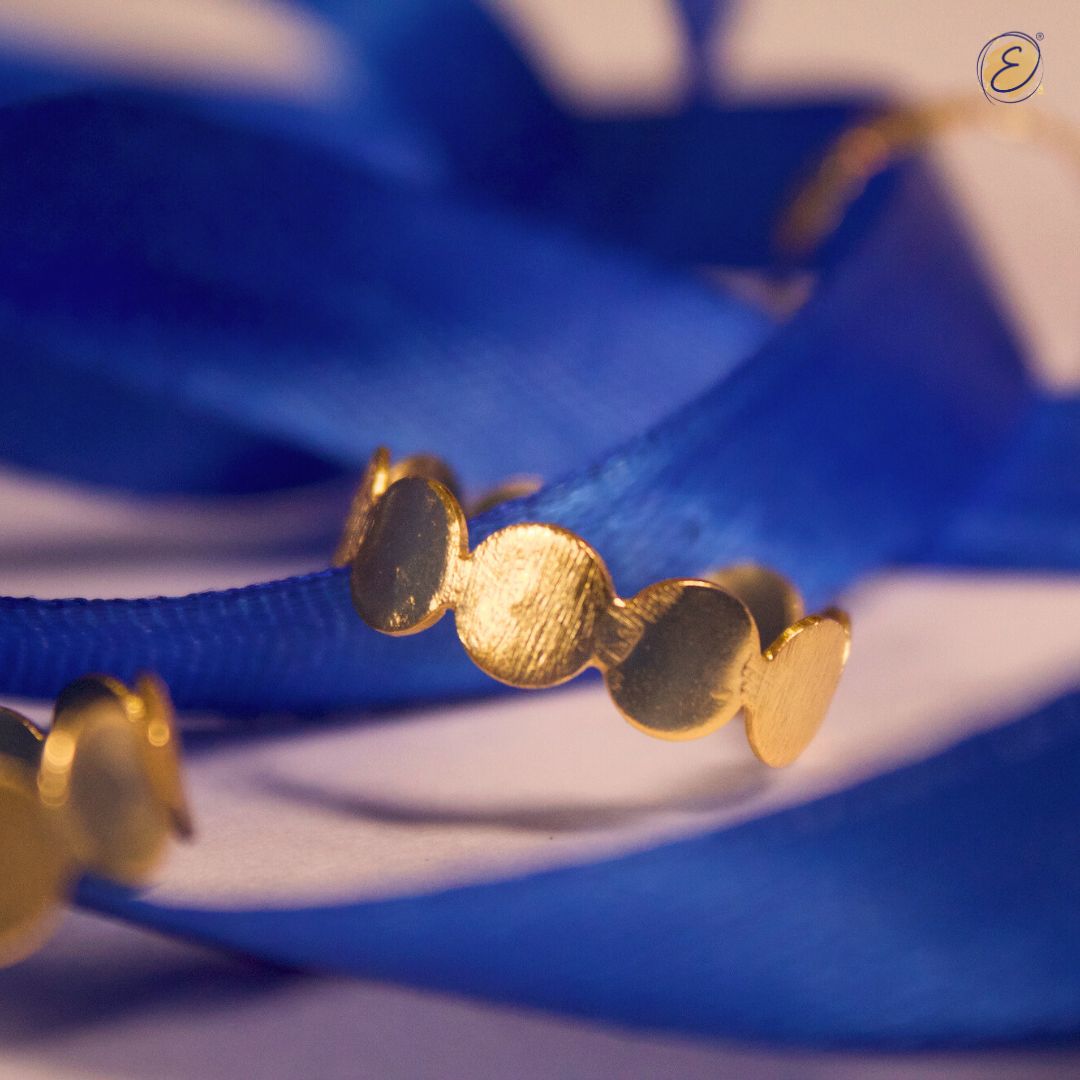 gold coined bracelet